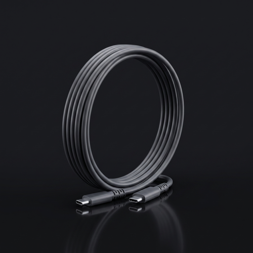Ori 3 USB-C cable assembly coiled on a dark surface